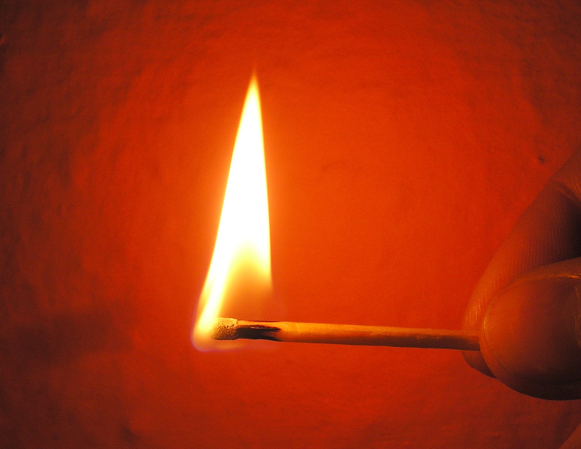 A burning matchstick.
