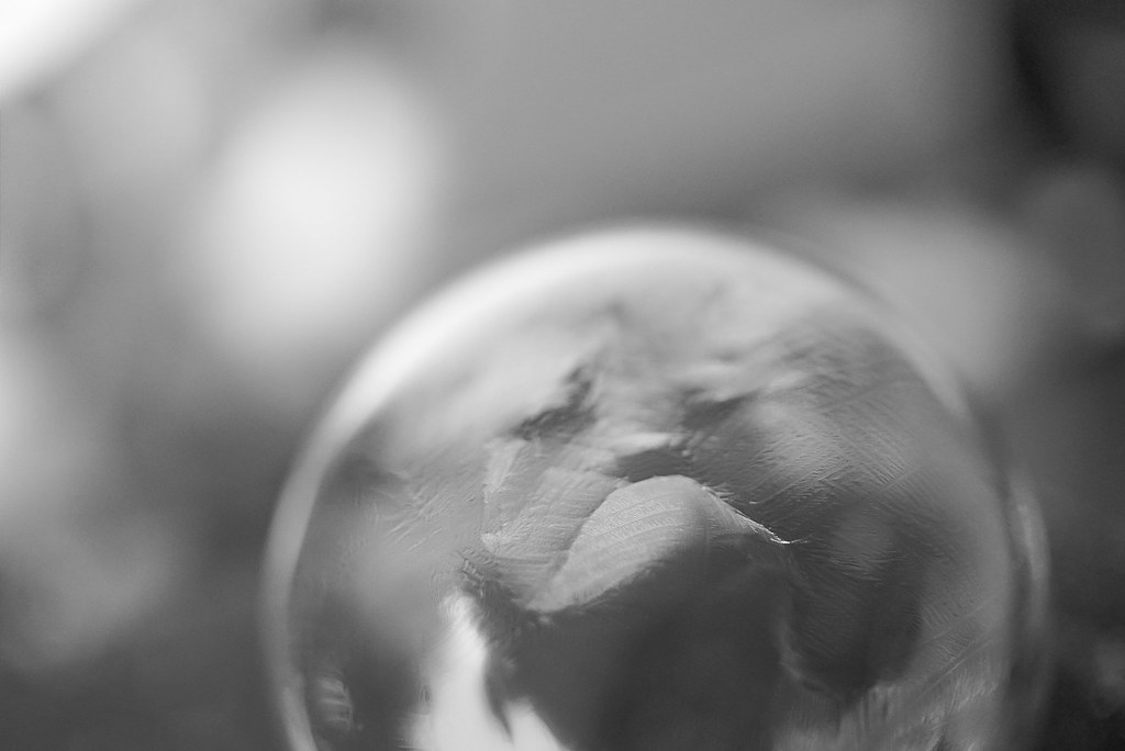 A close-up image of a refrigerator with a dream bubble above it.