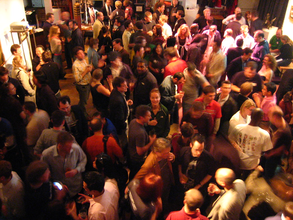 A crowded and lively party scene.