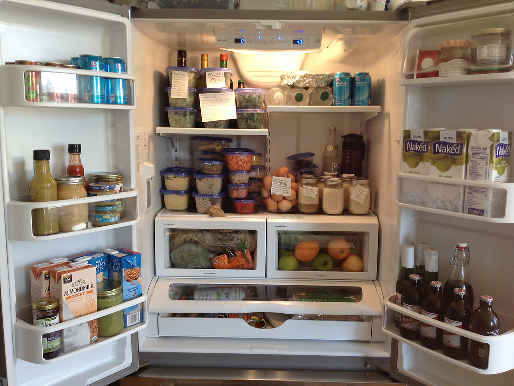 A full fridge stocked with food.