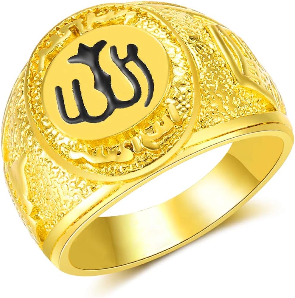 A gold ring with spiritual or Islamic symbols.
