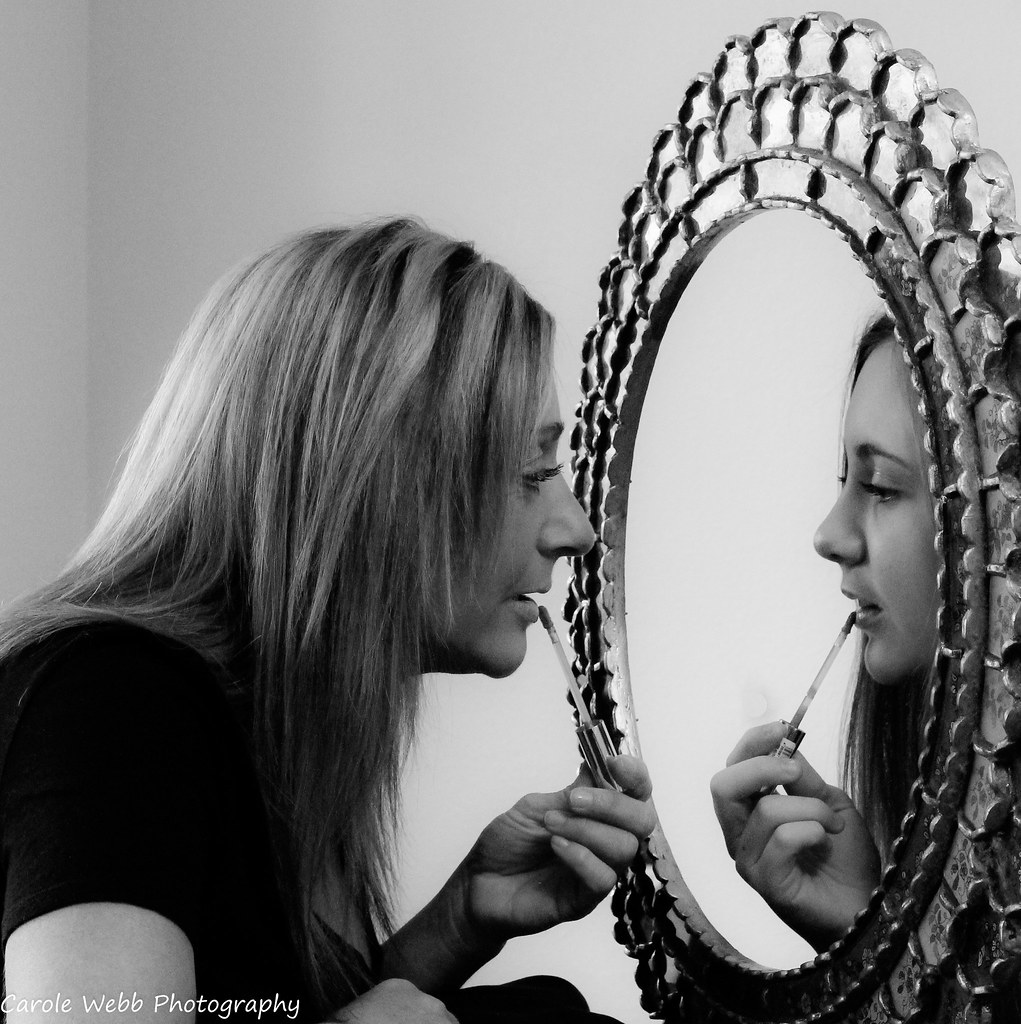 A mirror reflecting a dreamer's face.