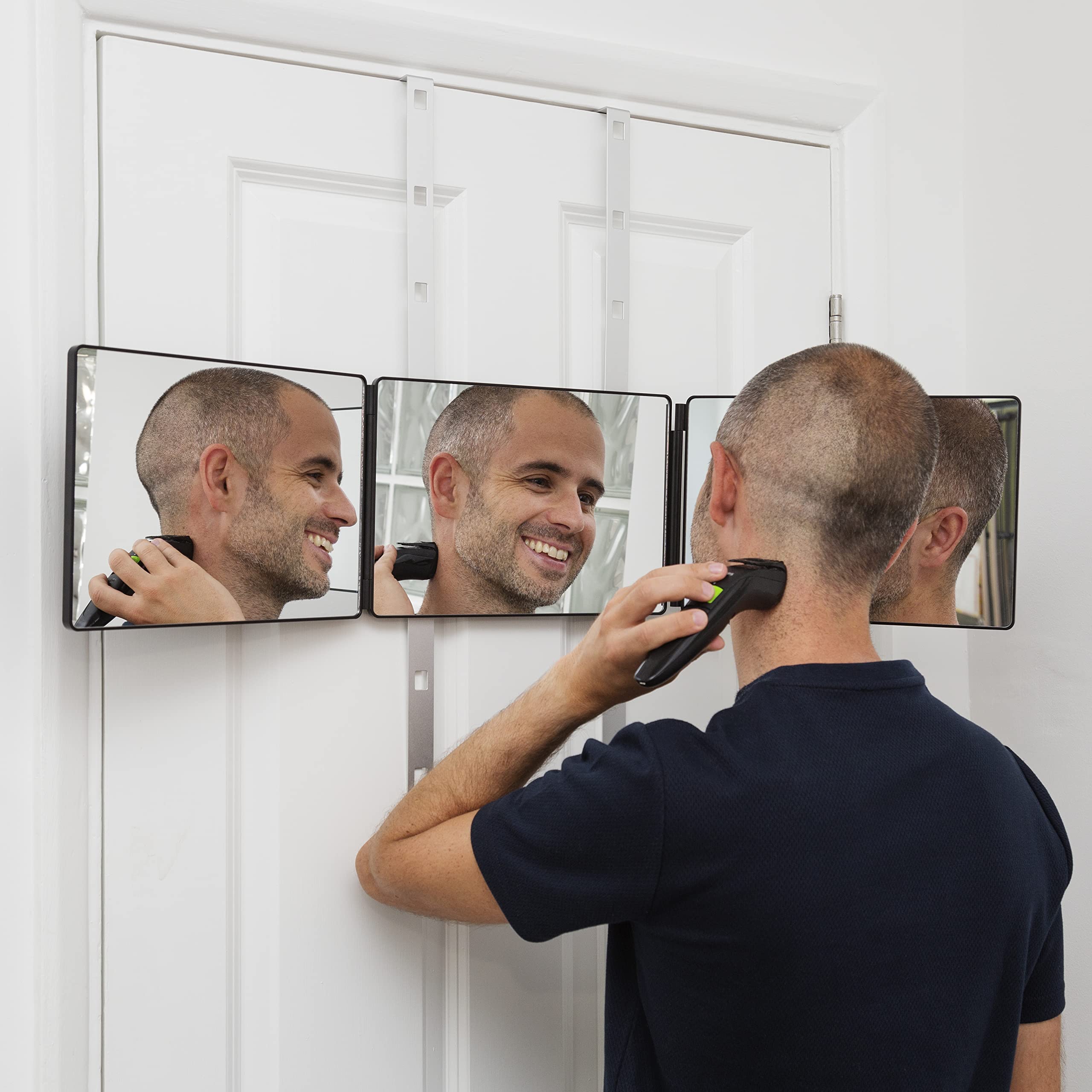 A mirror reflecting an unfinished haircut.