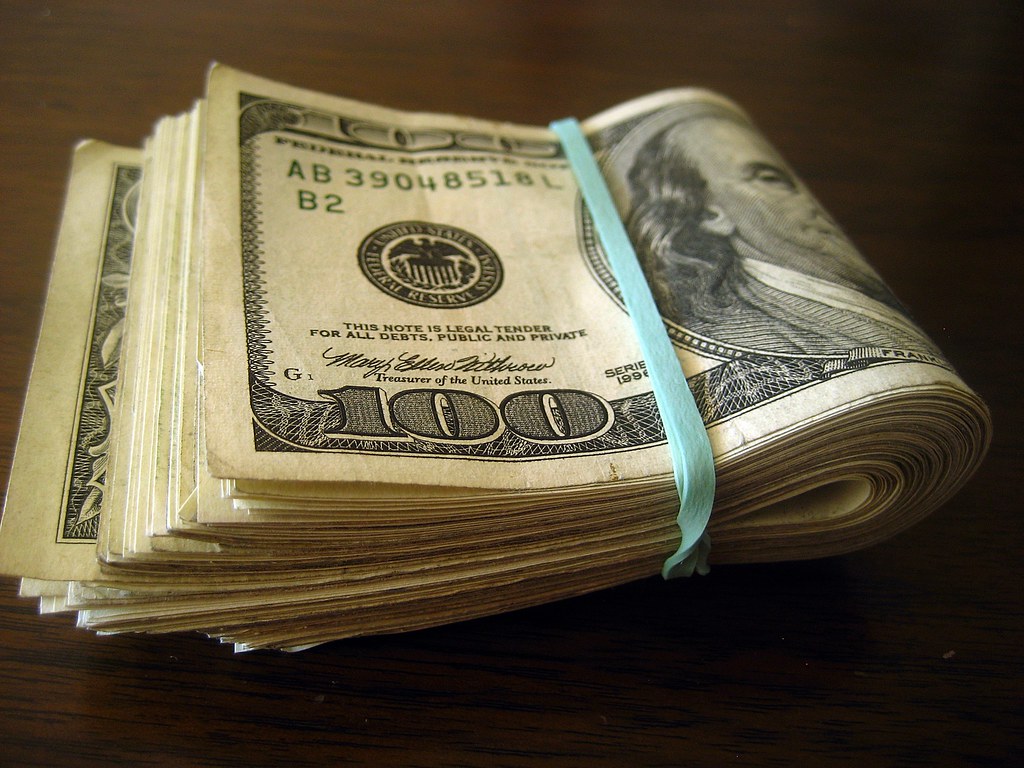 A stack of hundred dollar bills.