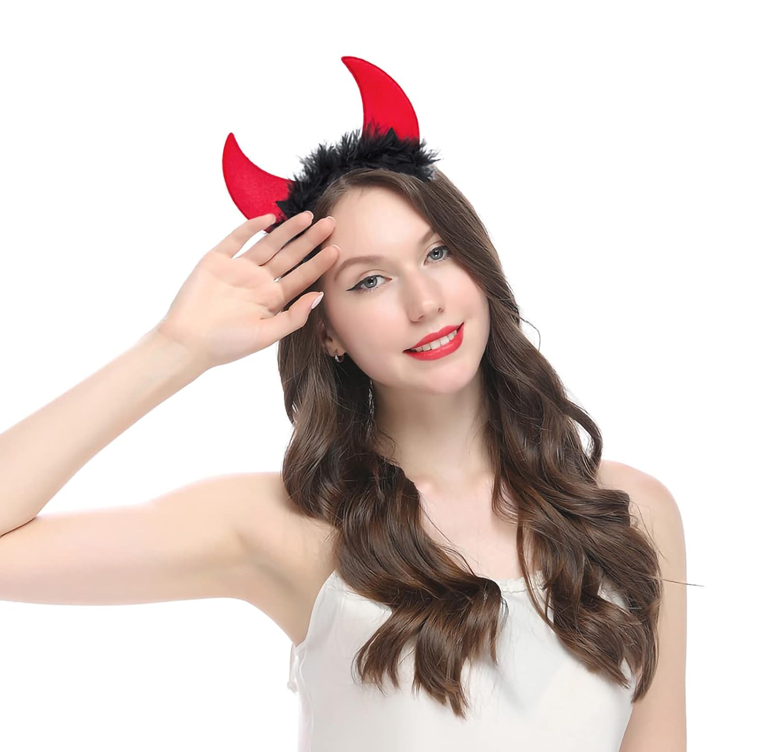 A young child with devil horns