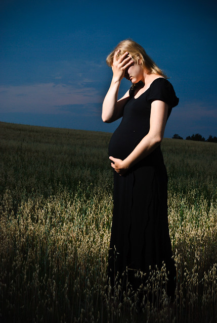 Pregnant woman, person grieving, and caregiver.