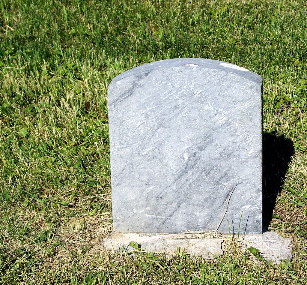 Presenting gifts to a tombstone